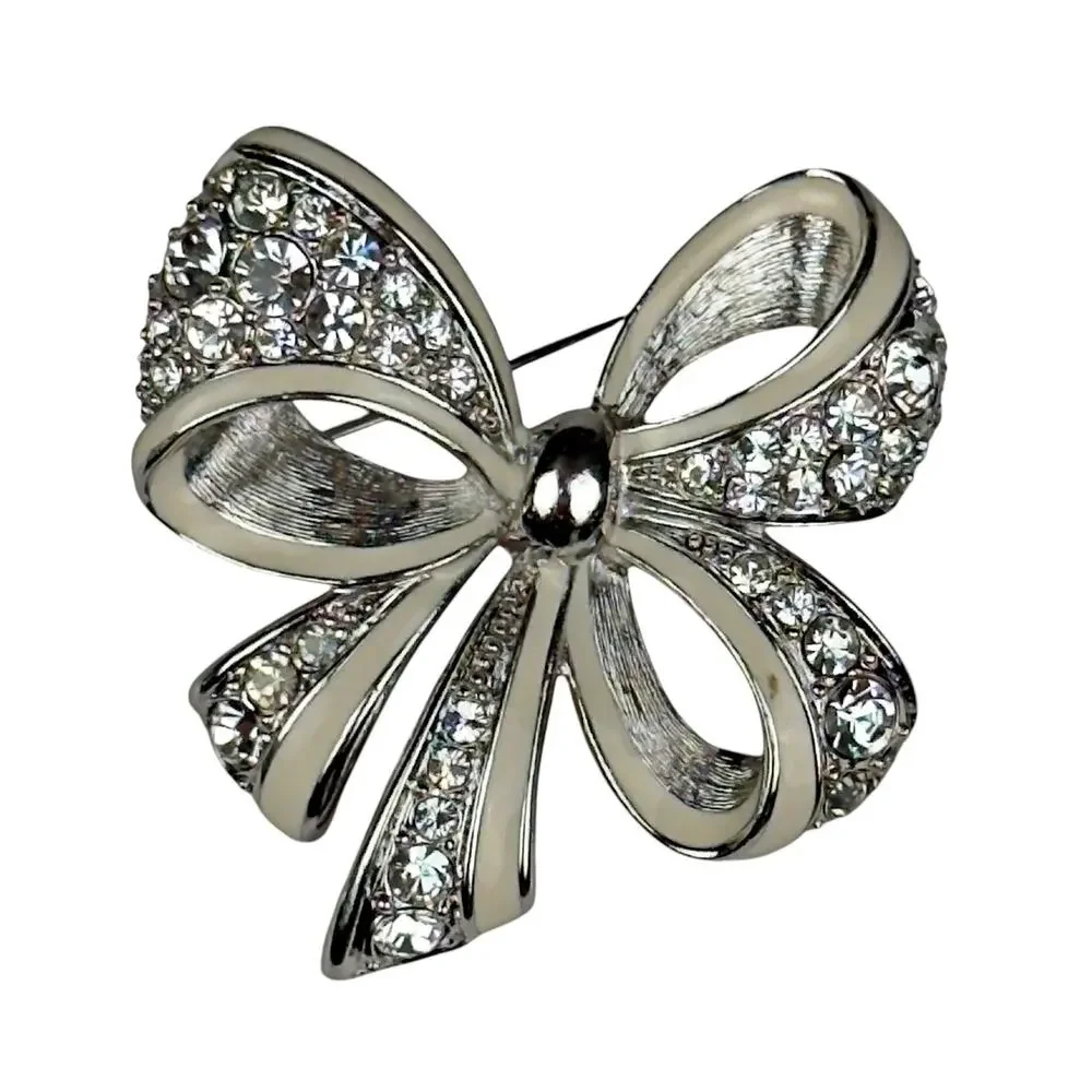 Vintage Nolan Miller Glamour Collection “Shining Spirit” Bow Brooch Silver Tone